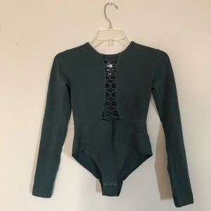 green bodysuit